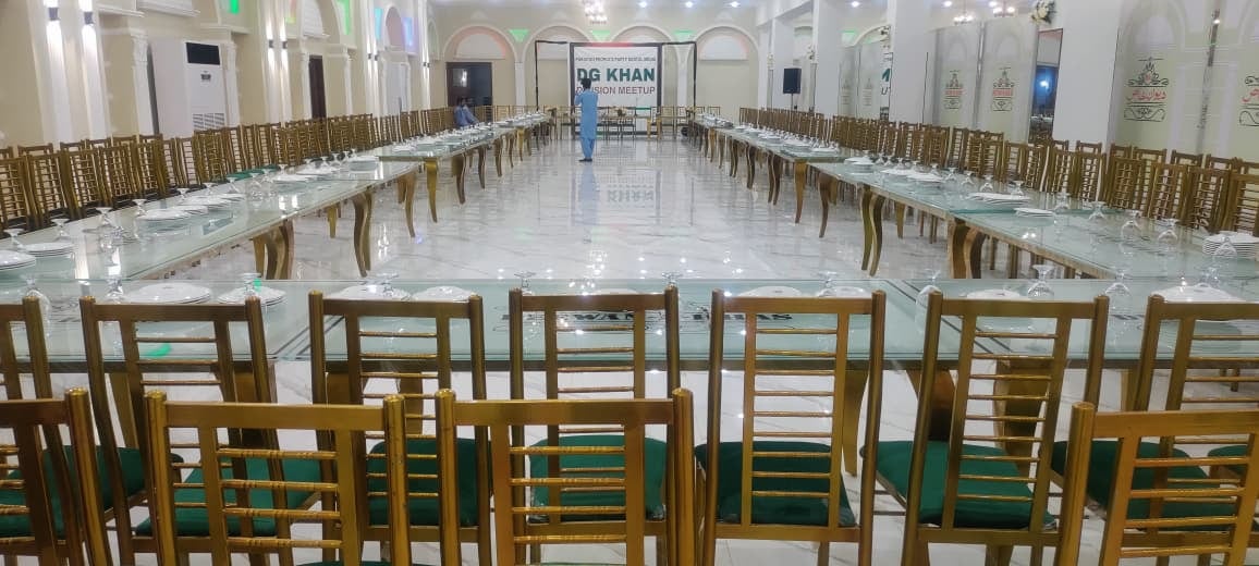 Dreams Hall banquet setup with long guest tables