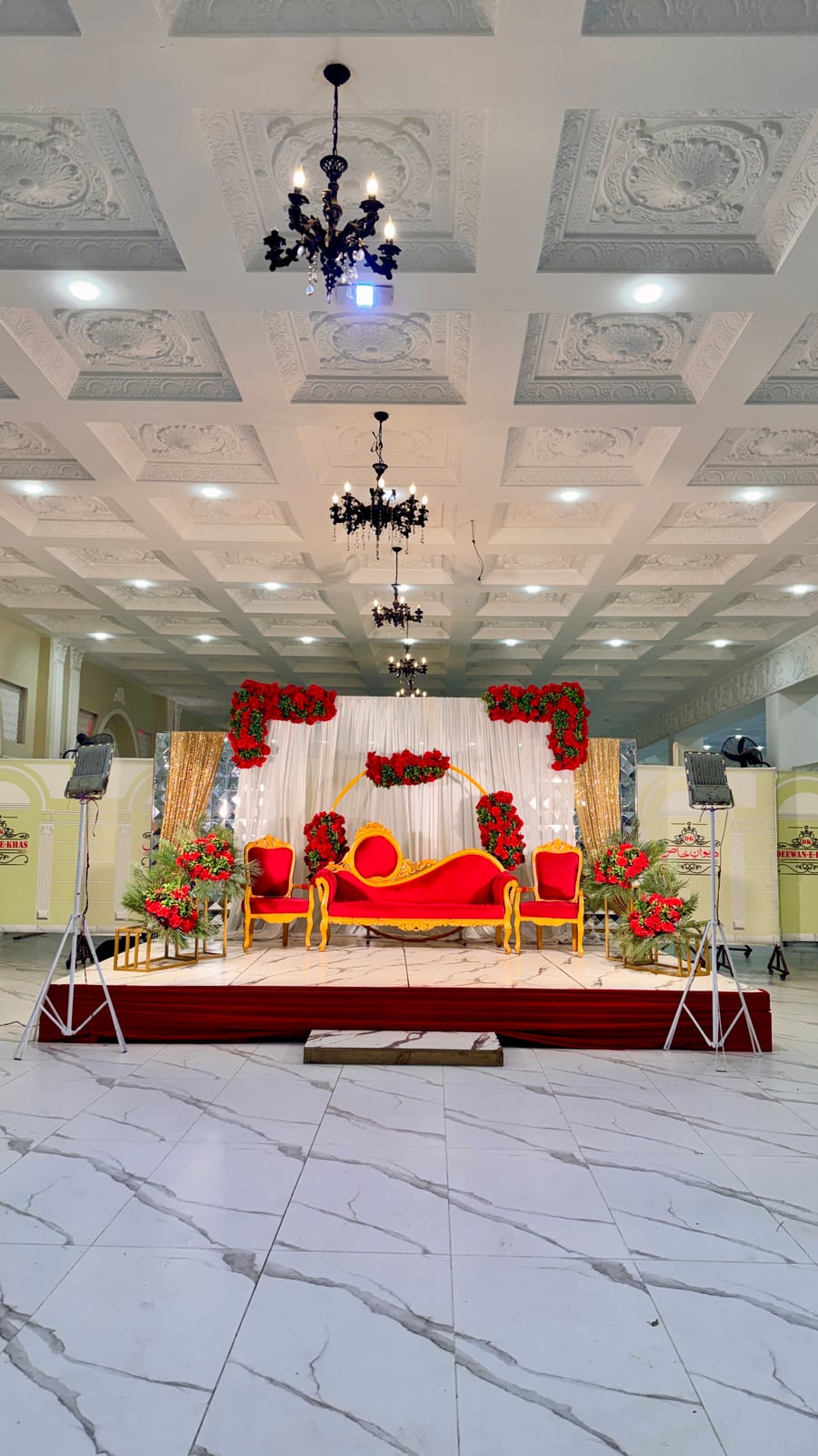Red-and-gold royal wedding stage
